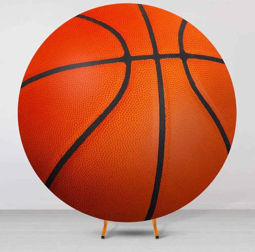Orange basketball backdrop with black lines, on a stand.