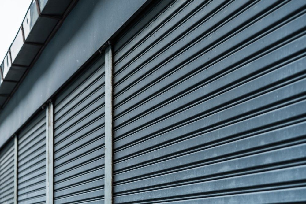 A Close up Of a Metal Garage Door on A Building — Gem Garage Doors in Macksville, NSW