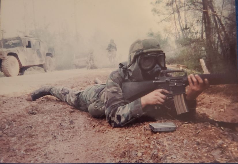 JP Quinn in tactical gear when he was a young solider