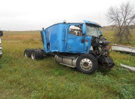 smashed blue truck