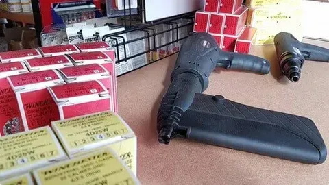 A Table Displaying Firearms and Boxes — Border Bolts & Fasteners in Tweed Heads South, NSW