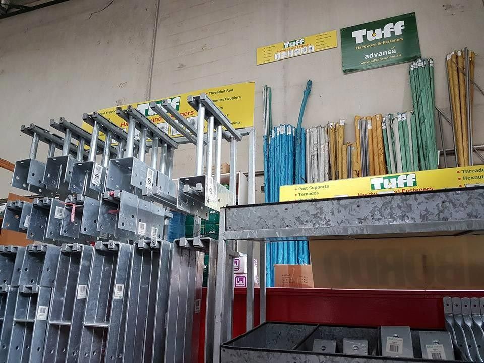A Bunch of Ladders Are Stacked on Top of Each Other — Border Bolts & Fasteners in Tweed Heads South, NSW