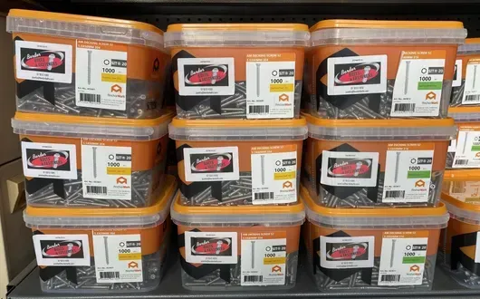 Boxes of Screws Are Stacked on Top of Each Other on A Shelf — Border Bolts & Fasteners in Tweed Heads South, NSW