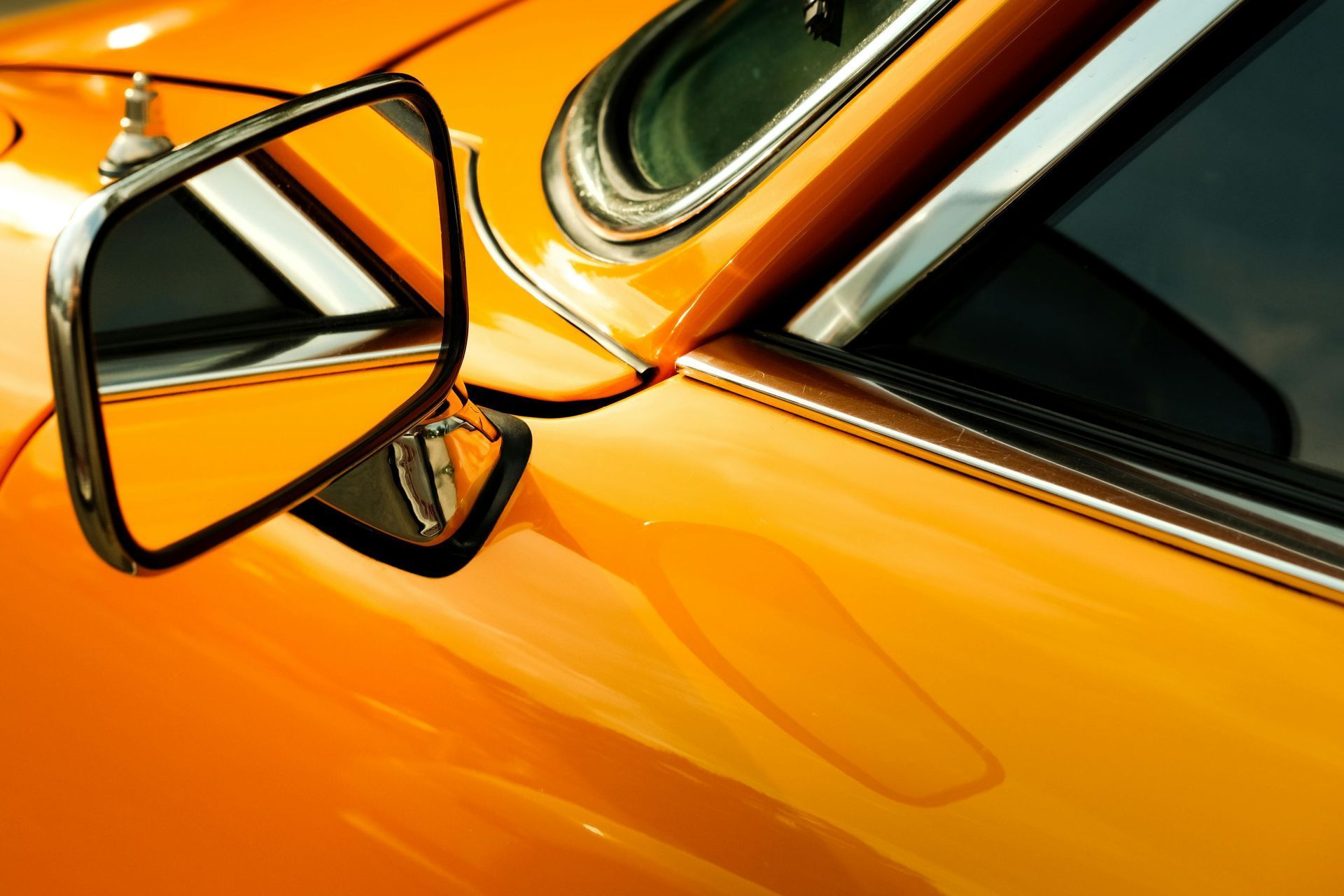 Close-up of Bright Orange Vintage Car Side Mirror — Coastal Collision Repairs in Buderim, QLD