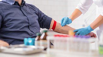 Flu Shots — Doctor Preparing Patient for Procedure in Wilmington, NC