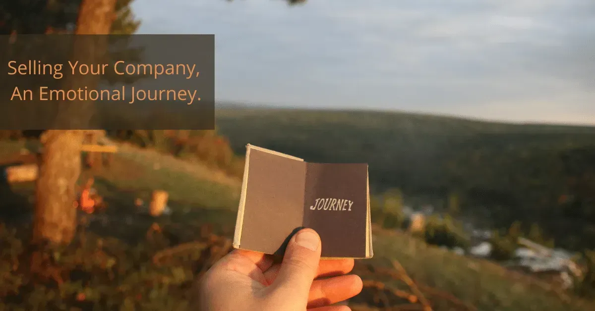 Hand holding open booklet titled 