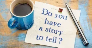 Blue mug of coffee next to a crumpled paper with the question 