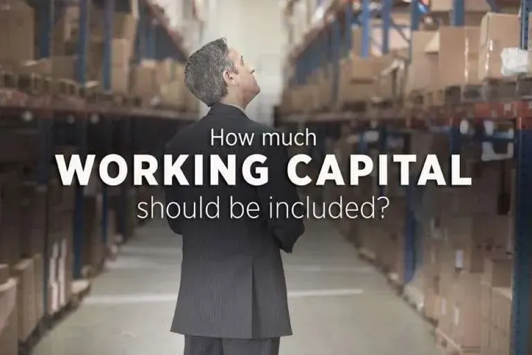 Man in suit looking up in a warehouse, text reads 