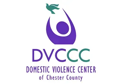 DVCCC logo: Purple figure reaching for a teal dove; 