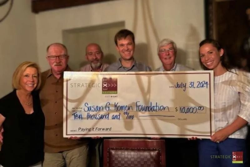 Group holding a large check for the Section 6 Kamon Foundation, dated July 31, 2024, for $10,000.