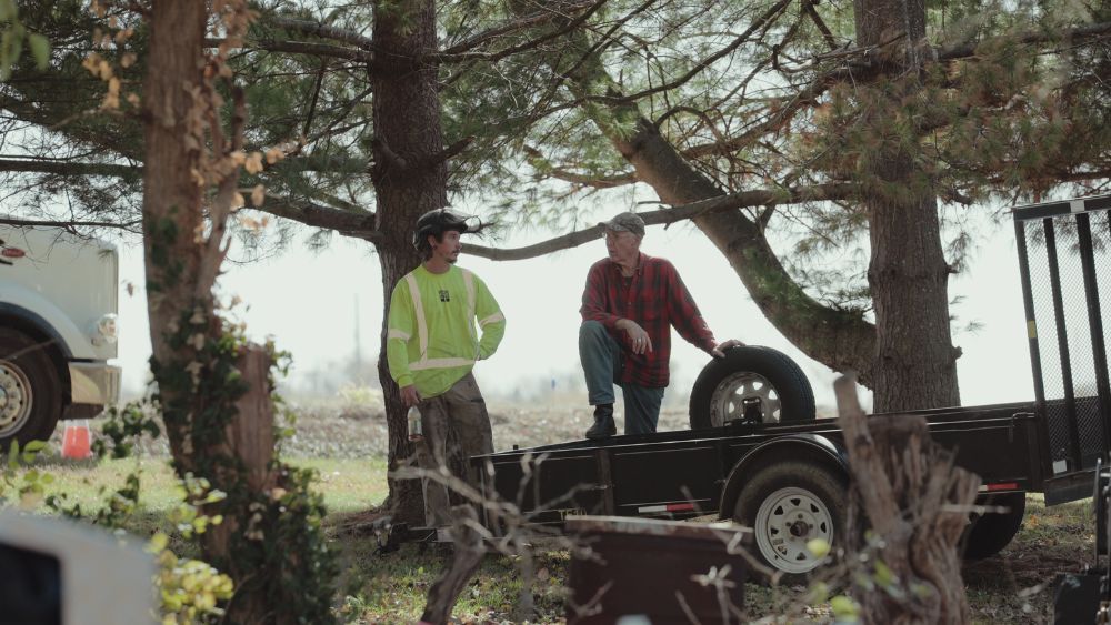 OLI arborist talking with customer
