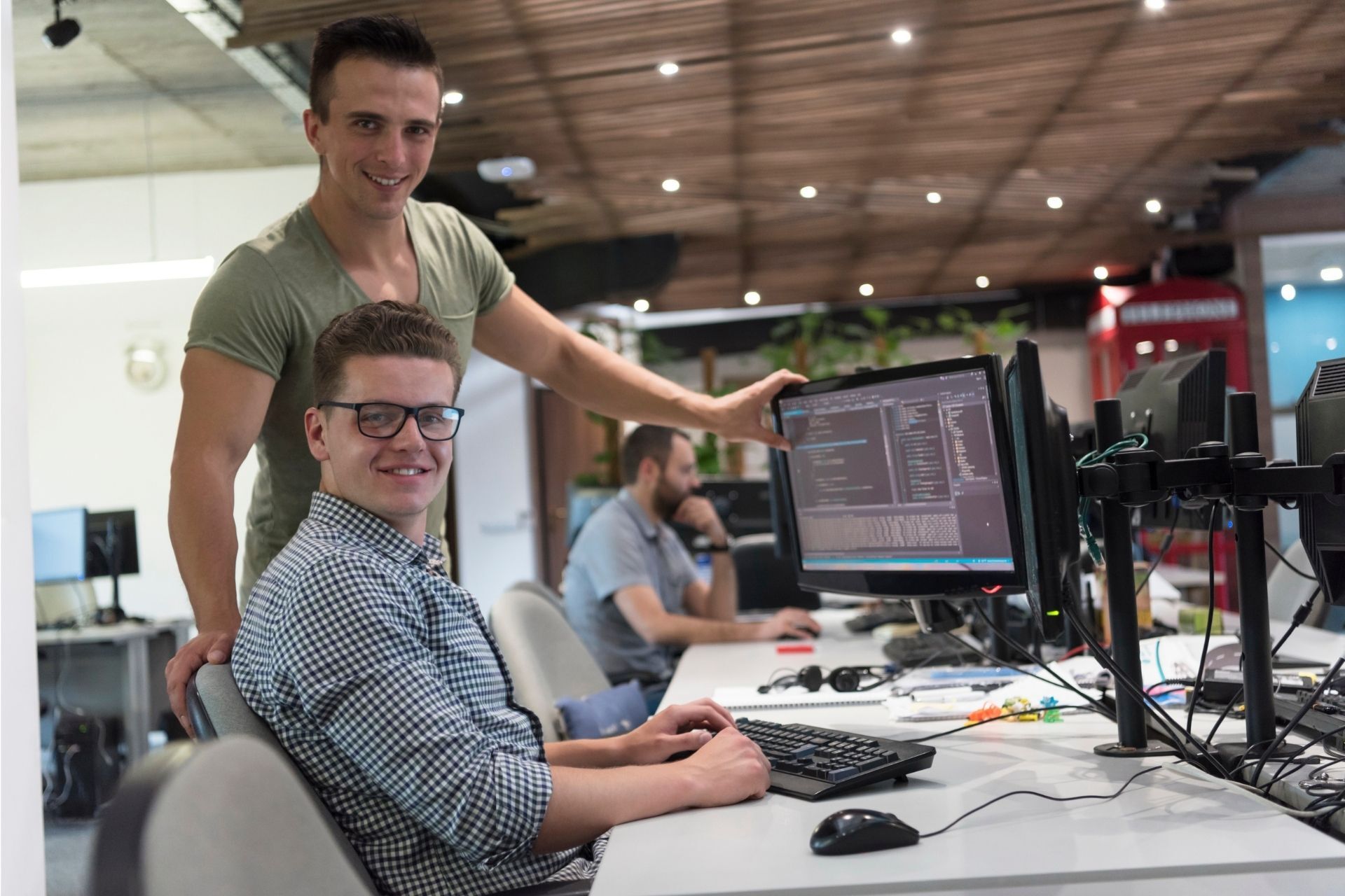 men sat at desk
