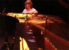 Women Tuning the Piano - Dawn Herrings Piano Service in Lancaster, PA
