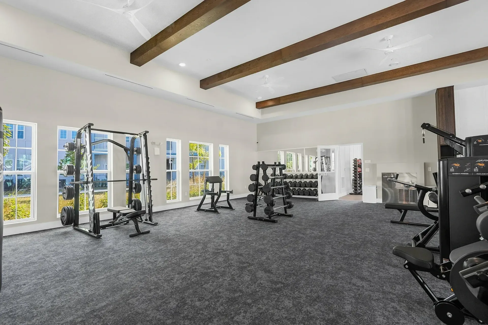 Experience the open and inviting fitness space, designed for optimum workouts.