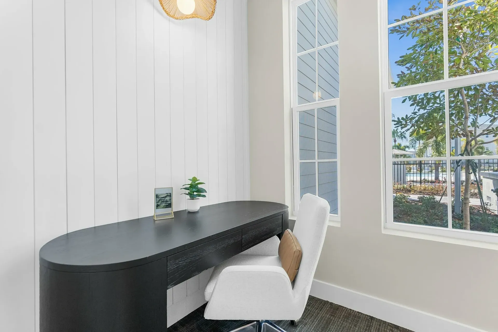Experience productivity in this stylish and serene home office corner.
