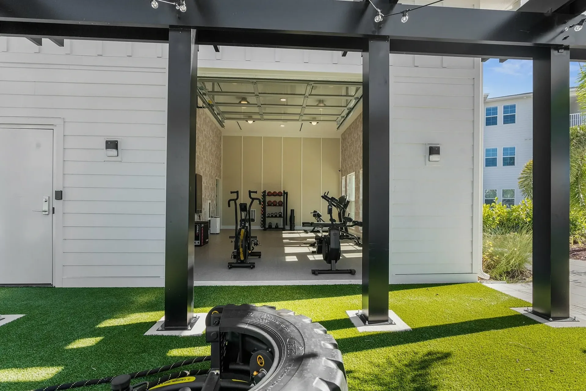 Get fit in style with this sleek and well-equipped home gym.