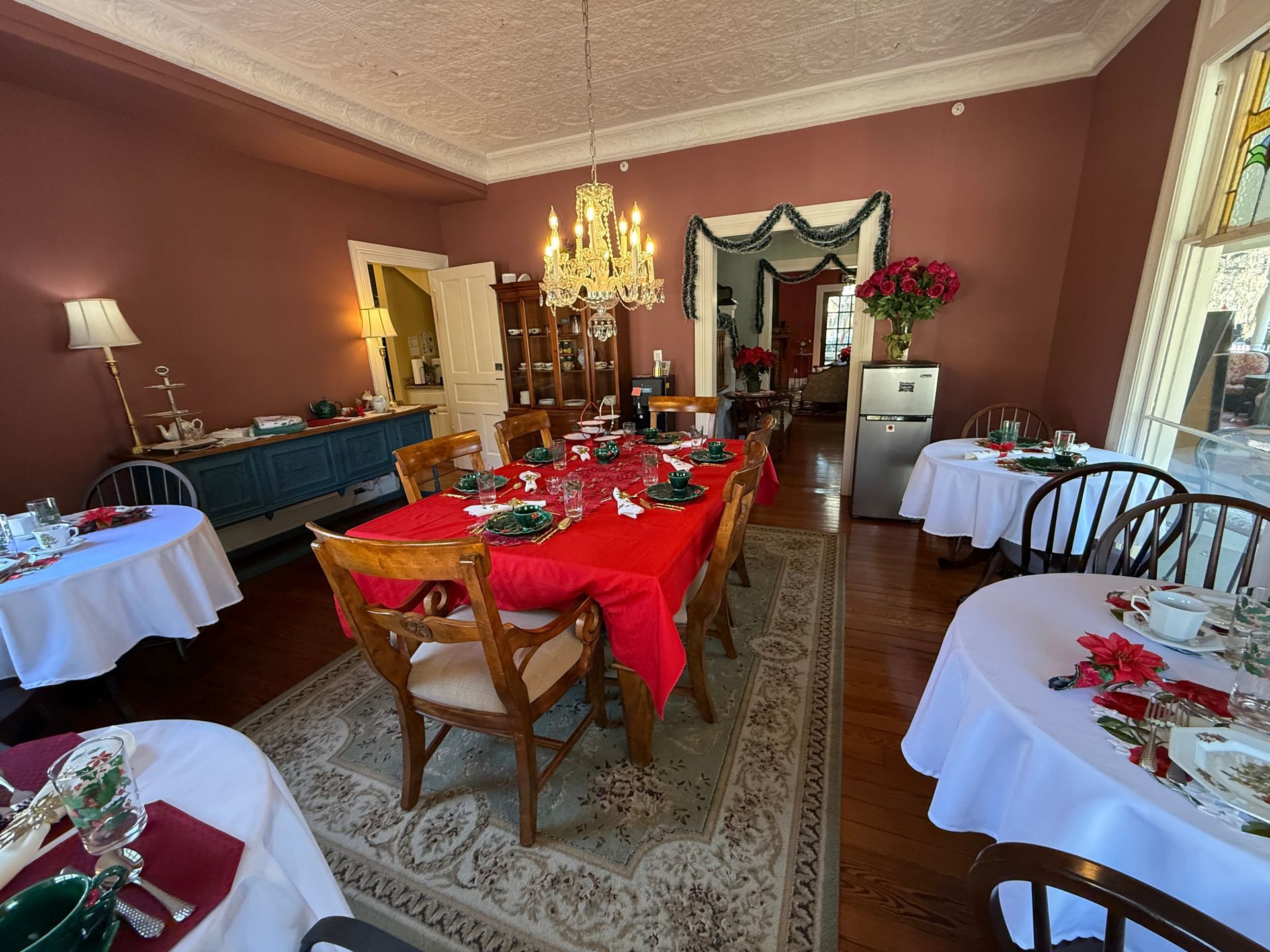 Holiday decorations at the afternoon tea in the dining room at The Camellia Rose Inn