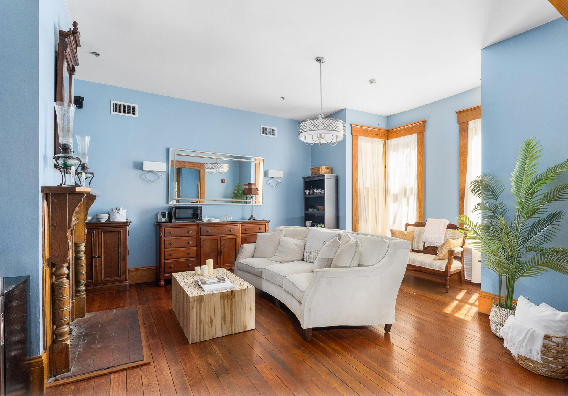 Aerial view of yellow Victorian Home