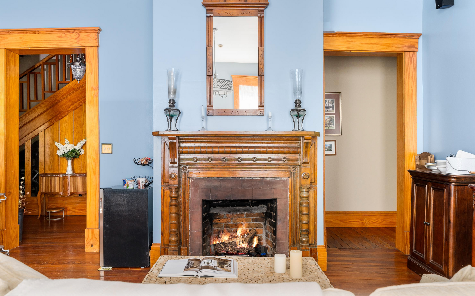 3 story yellow Victorian Home