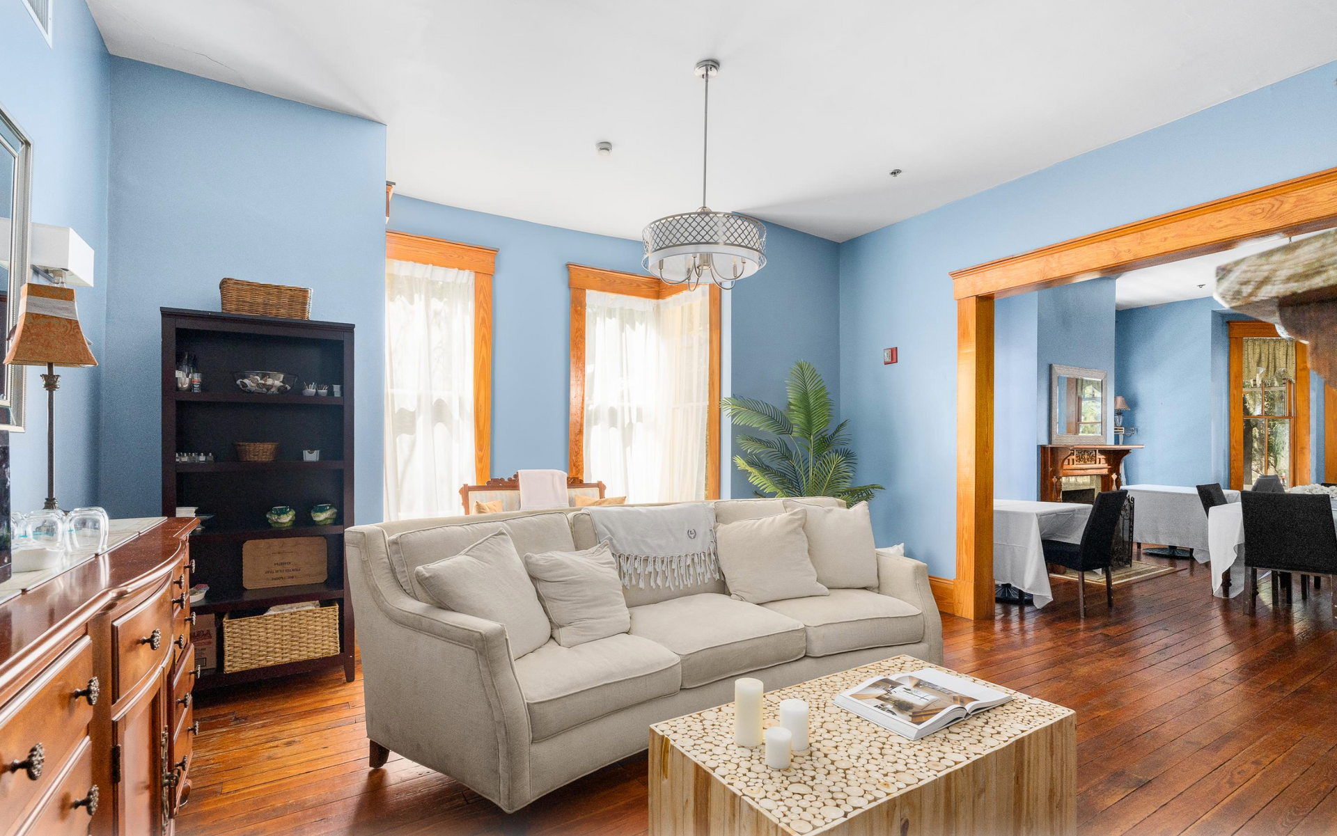 Living Room with ouch and bright windows.
