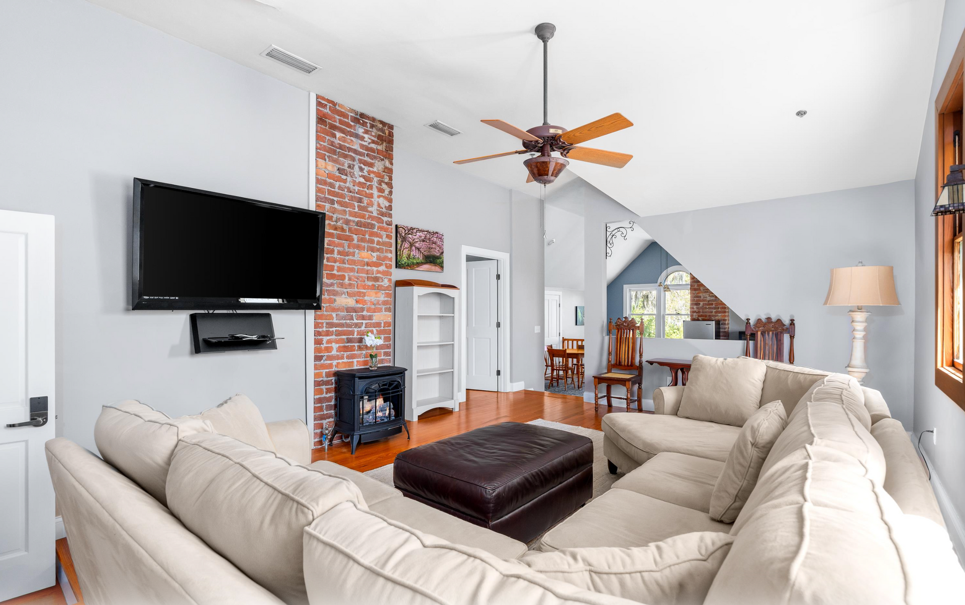 Room with couch and fan