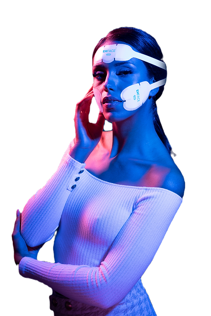 A woman with blue paint on her face is talking on a cell phone.