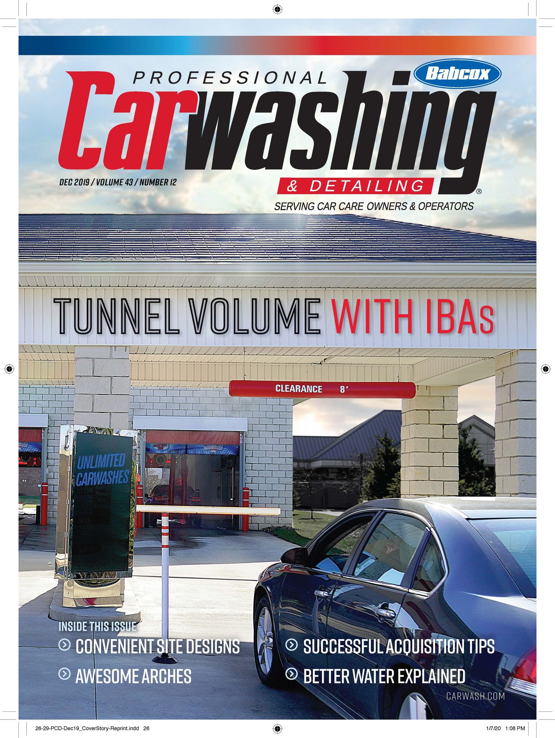 The cover of a car washing magazine shows a car being washed at a car wash.