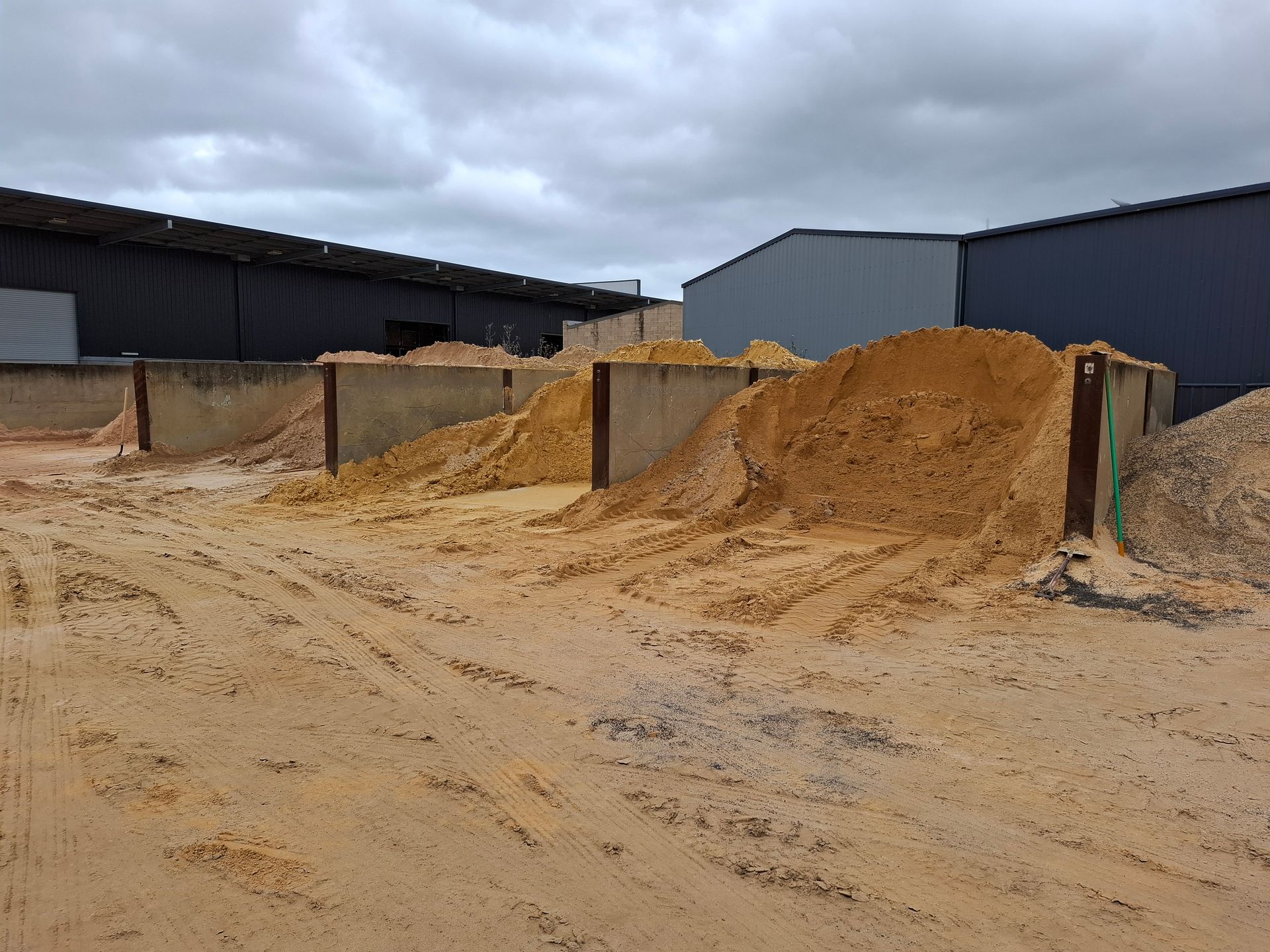 Workers Pouring Cement Mix – South Geelong – Barry Medew Building Supplies