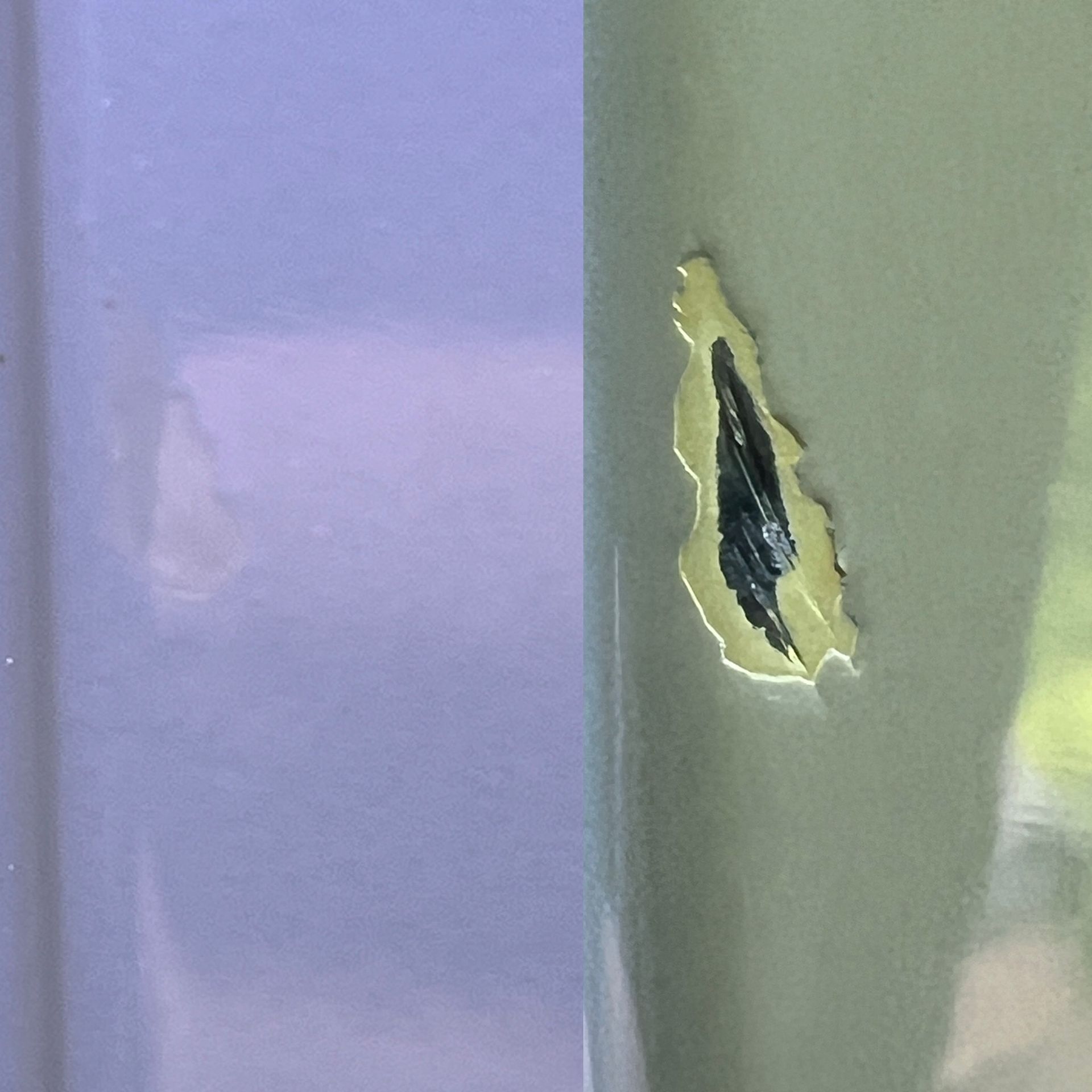 Torn pale green painted surface revealing dark layer beneath, with a section of purple paint visible.