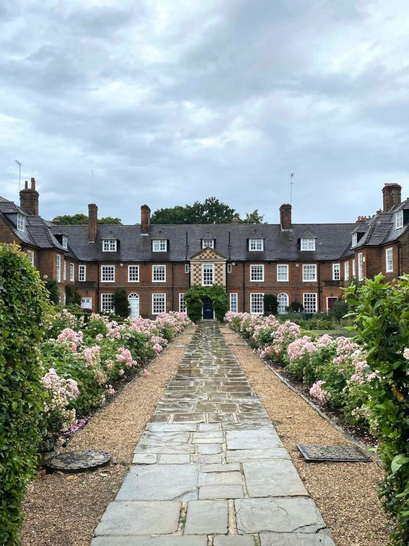 A stone walkway leading to a large brick building in Doncaster.