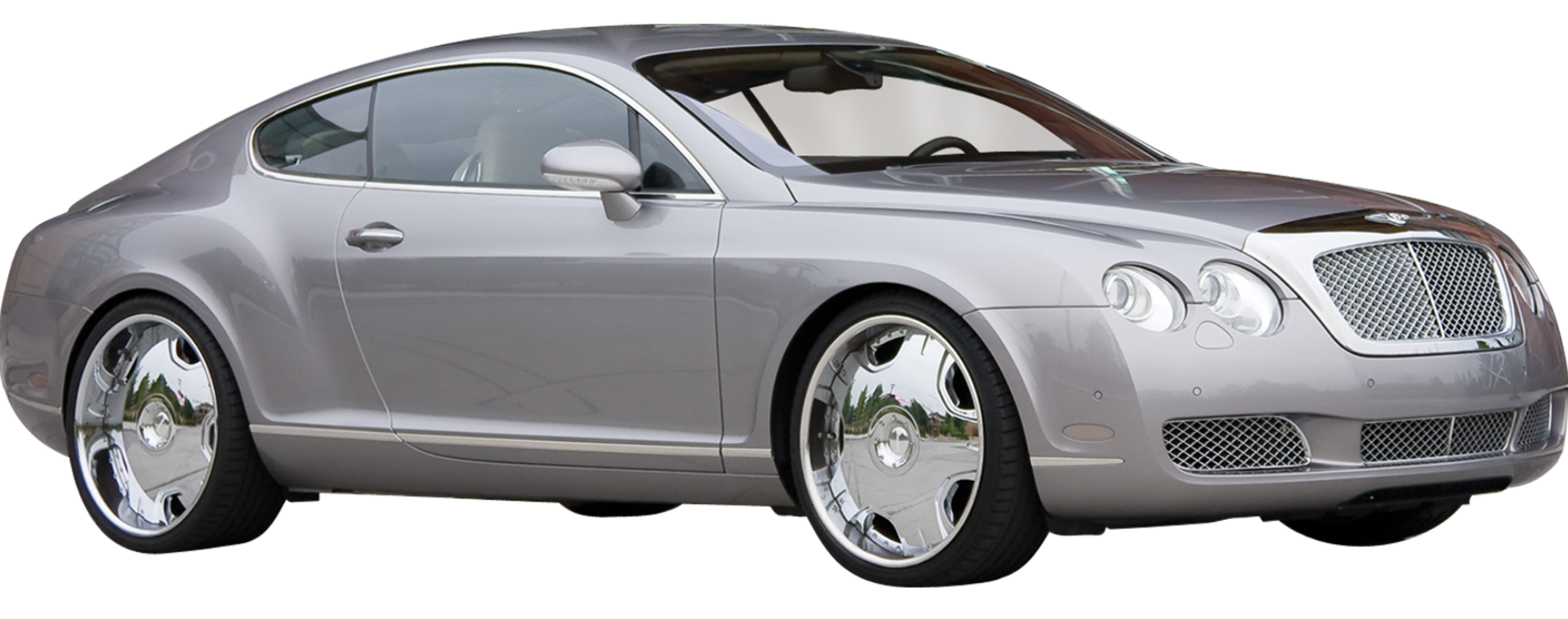 A silver bentley continental gt is shown on a white background. A silver bentley continental gt is shown on a white background.