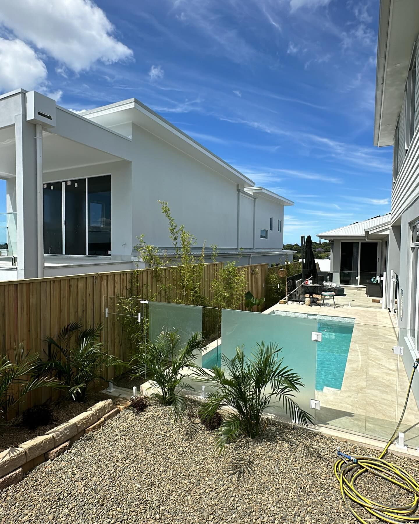 There is a Swimming Pool in the Backyard of a House — Fence & Deck Australia Pty Ltd in Casino, NSW