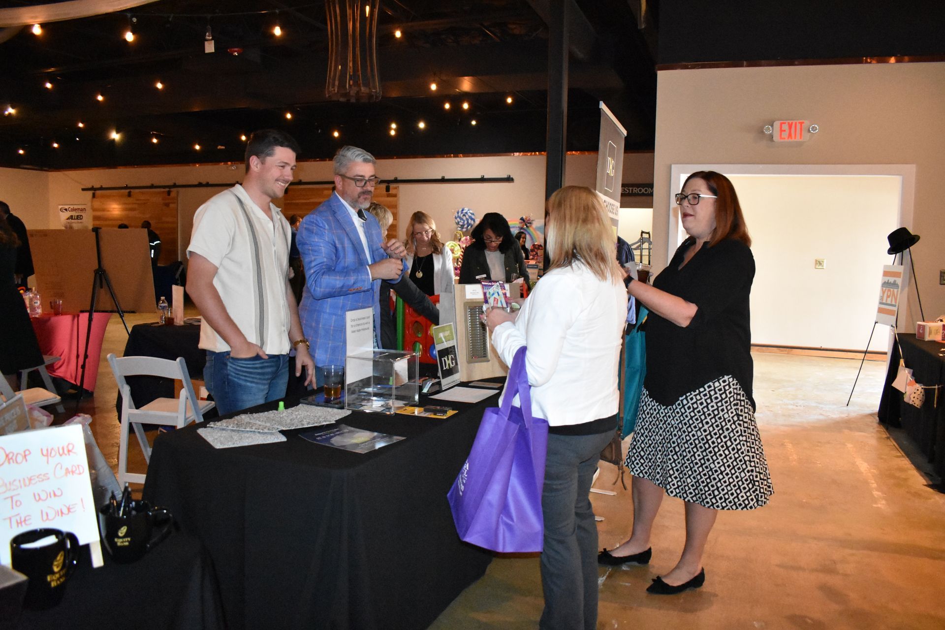 A group of people are having a meeting in an office.