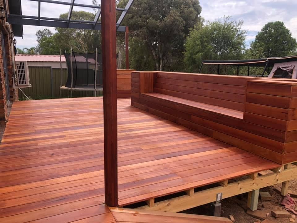 A Wooden Deck With A Bench In The Middle Of It — L & S Wirth Painting in Coonamble, NSW