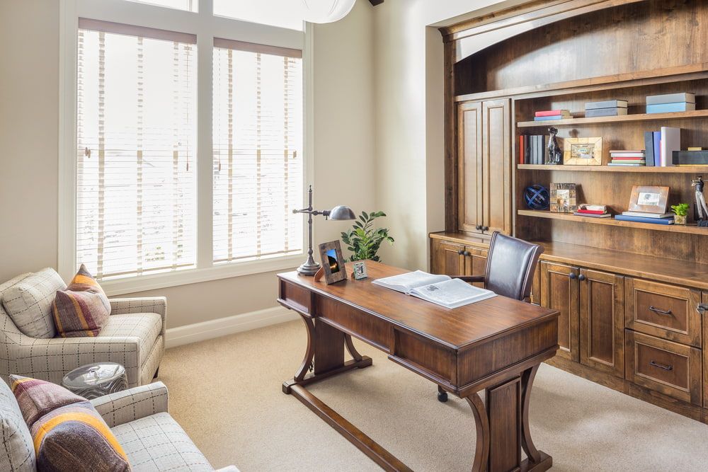 A Home Office With A Desk, Chair, Couch And Shelves — L & S Wirth Painting in Gilgandra, NSW