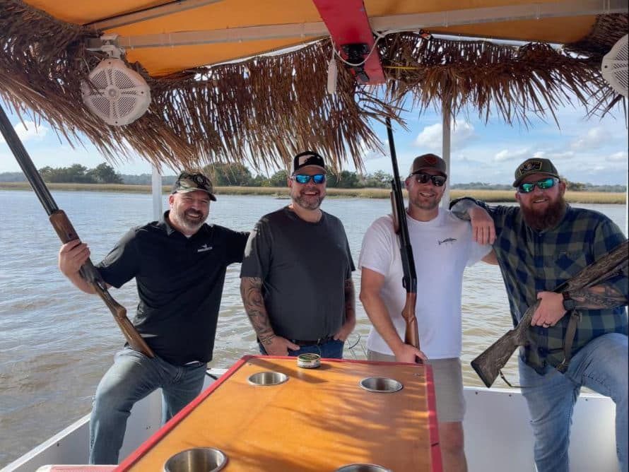 4 guys on a boat