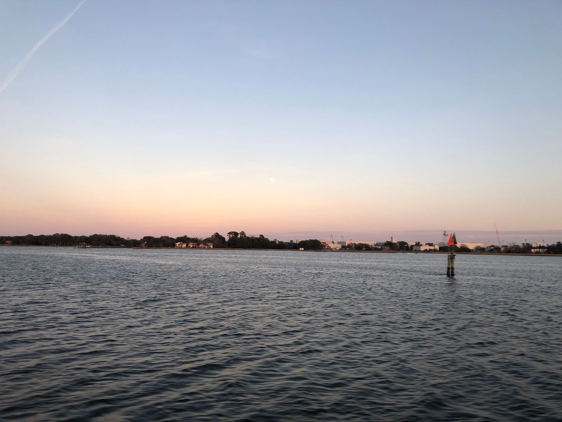 A buoy in the middle of a body of water