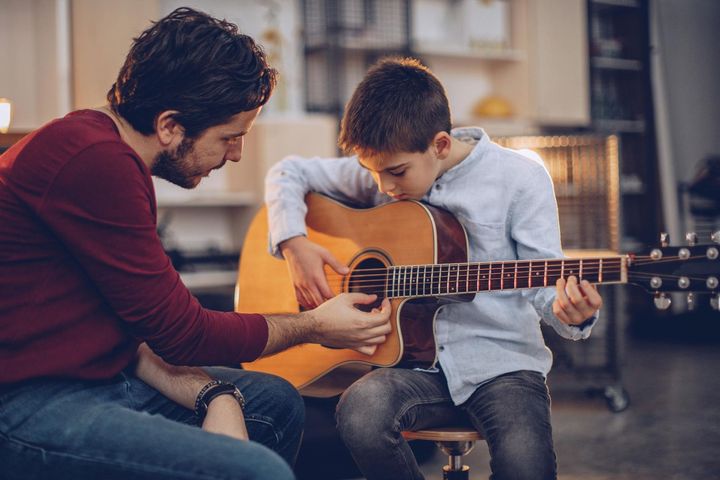 Teaching the boy to play the guitar | Penrith, NSW | Penrith School Of Guitar