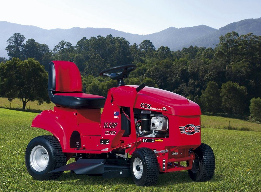 large red riding lawn mower