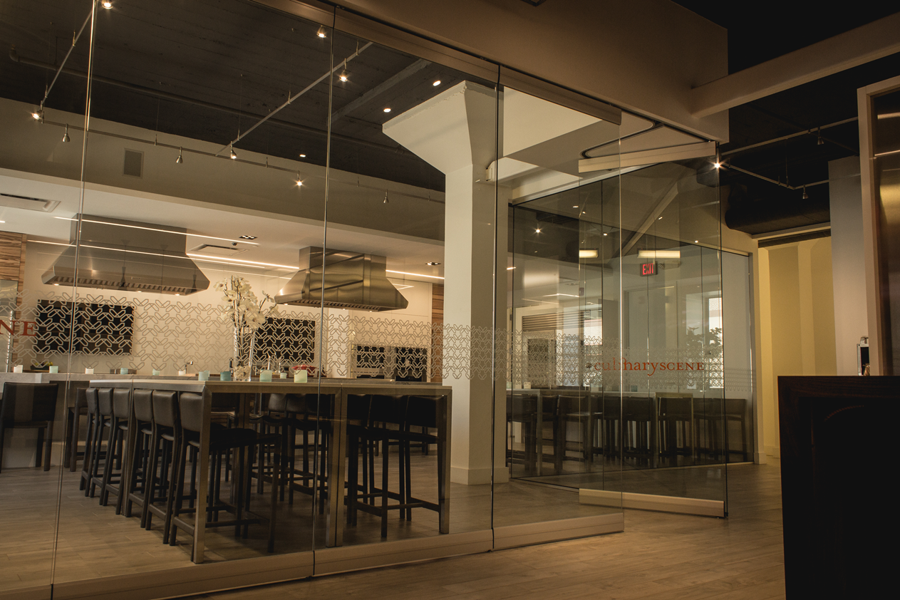 A restaurant with a lot of tables and chairs in it