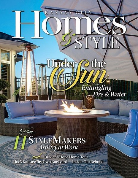 The cover of homes & style magazine with a fire pit on the cover
