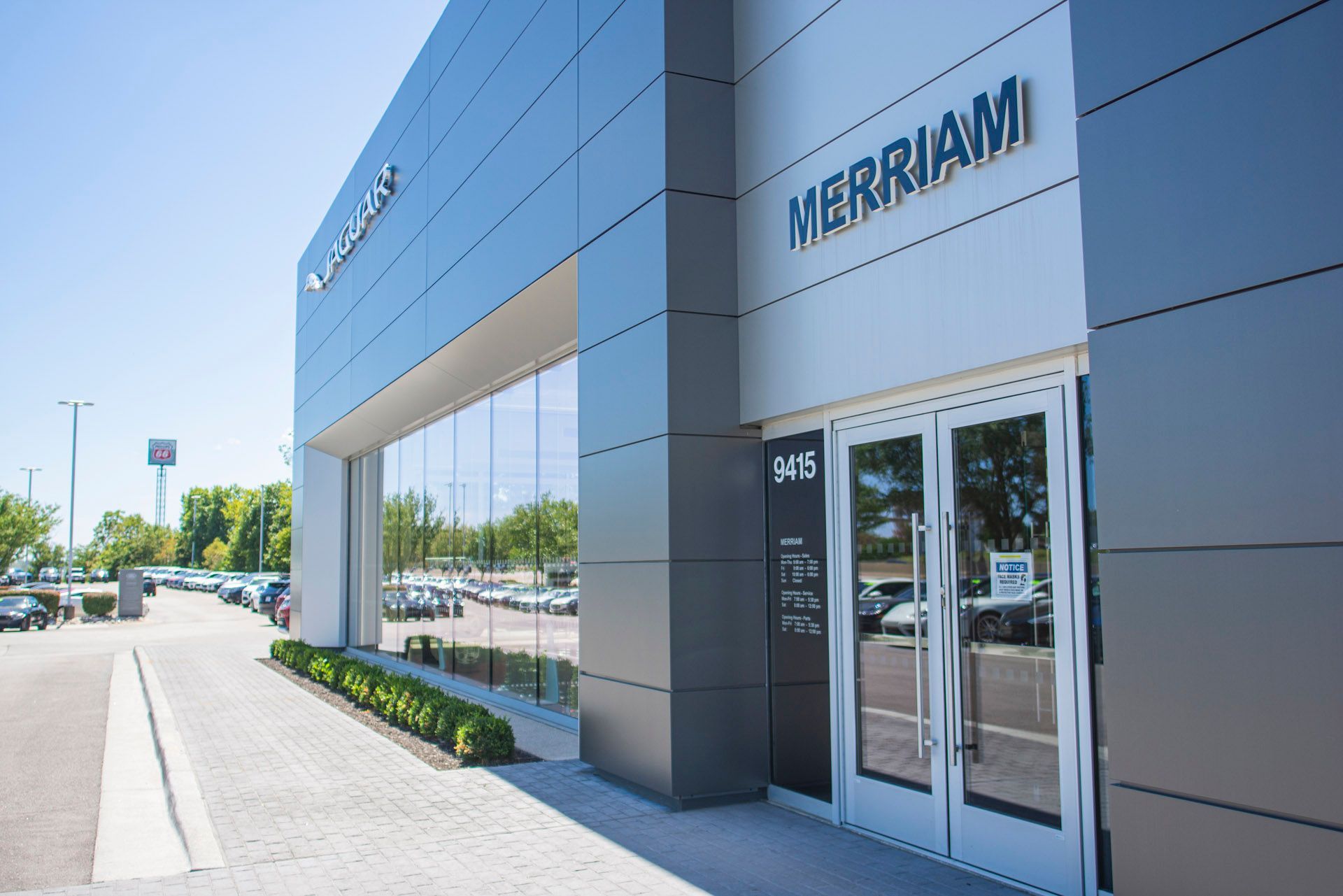 A car dealership with merriam written on the side of it