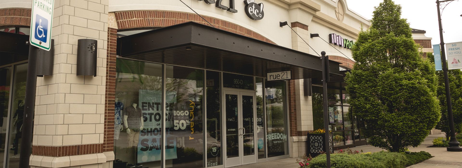 The front of a building with a canopy over the entrance.