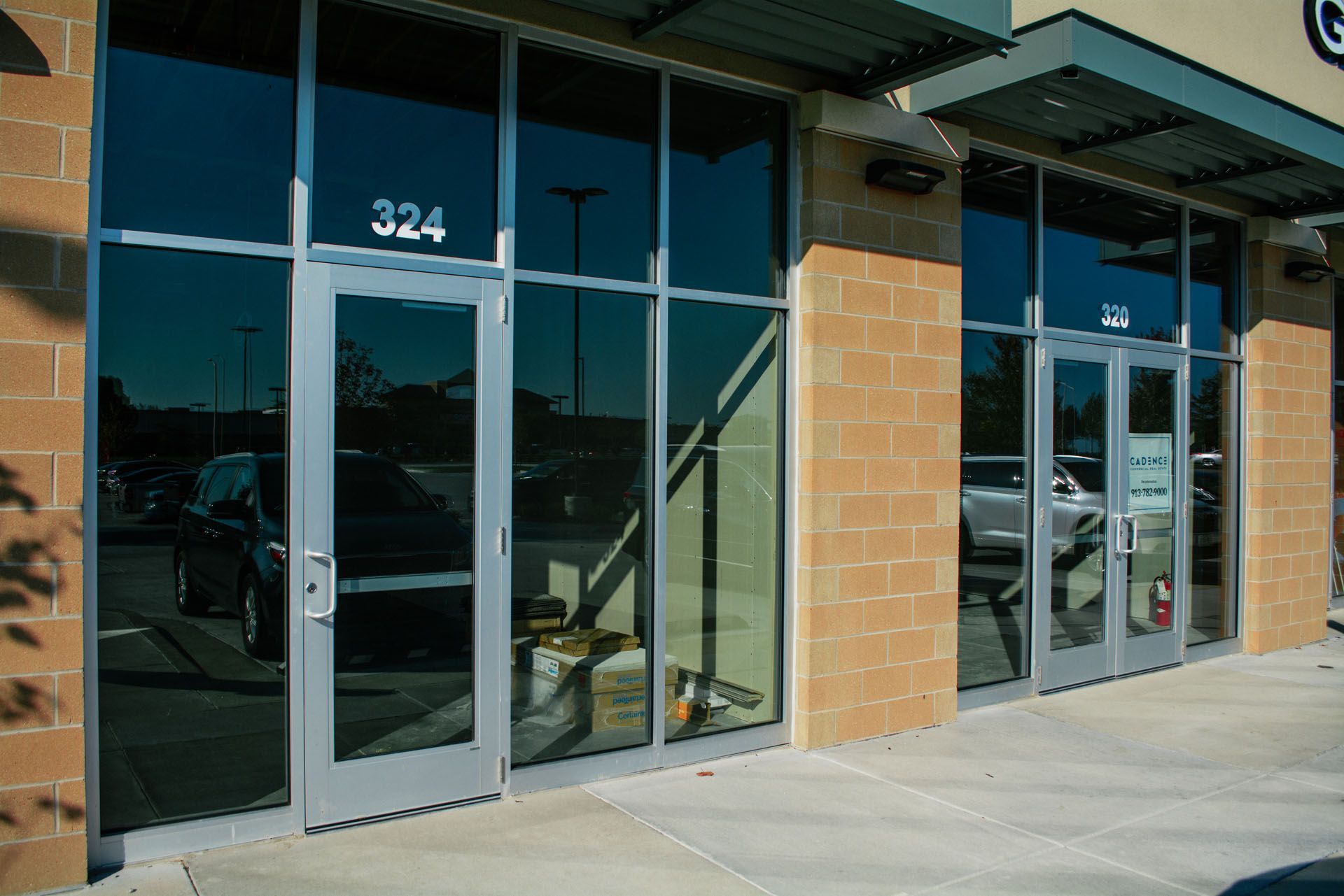 A building with a lot of windows and the number 324 on it