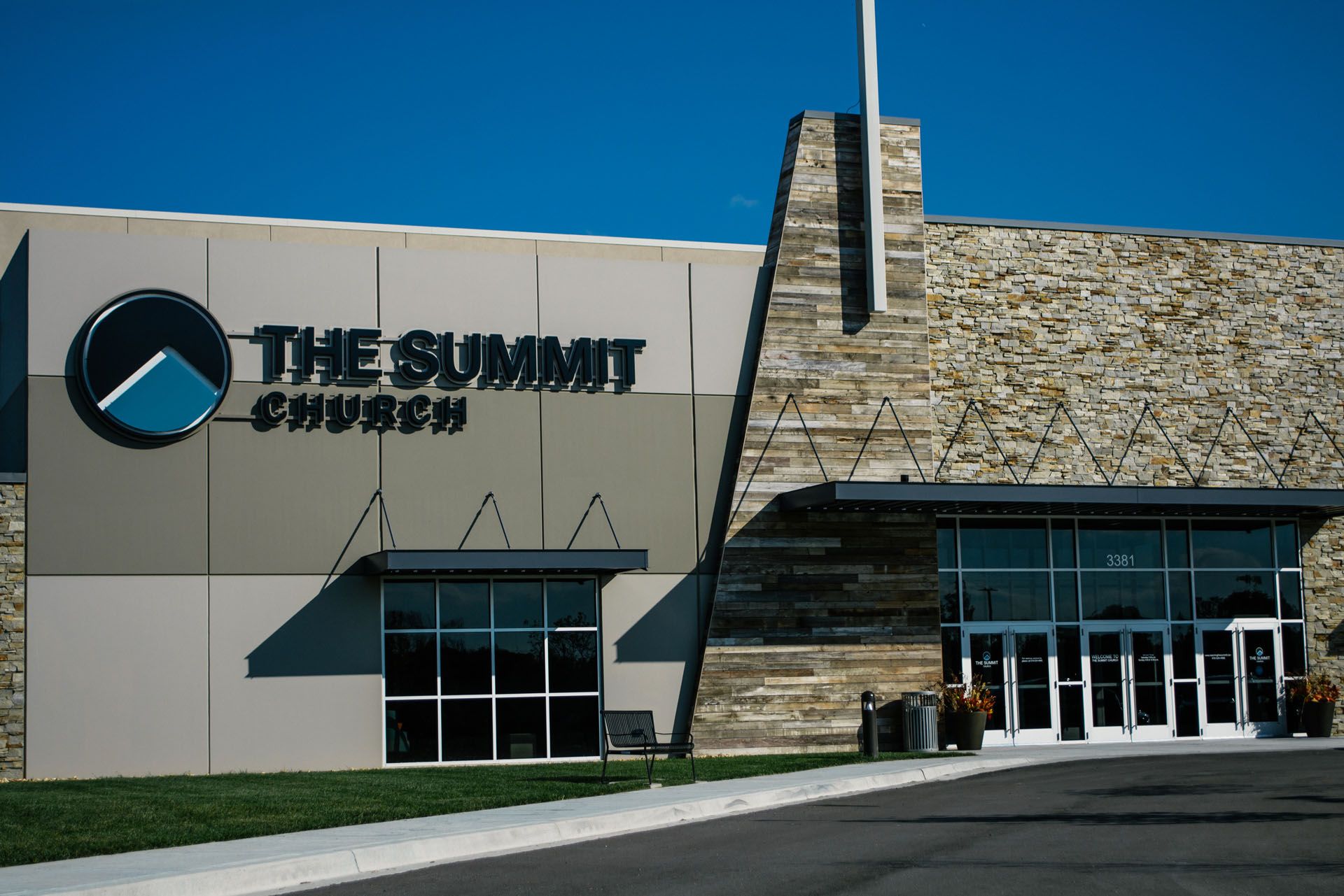 The front of the summit church with a cross on top