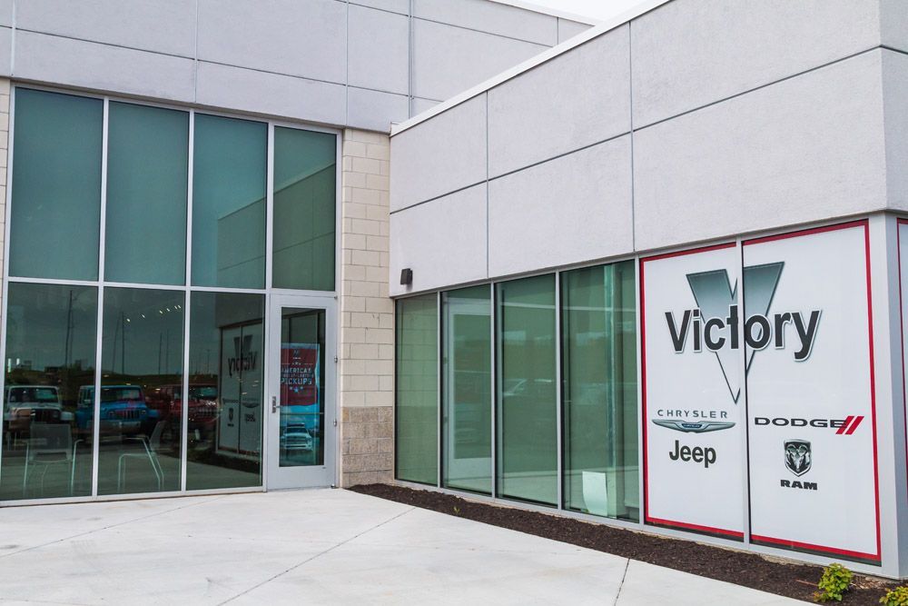 A building with a sign that says victory on it