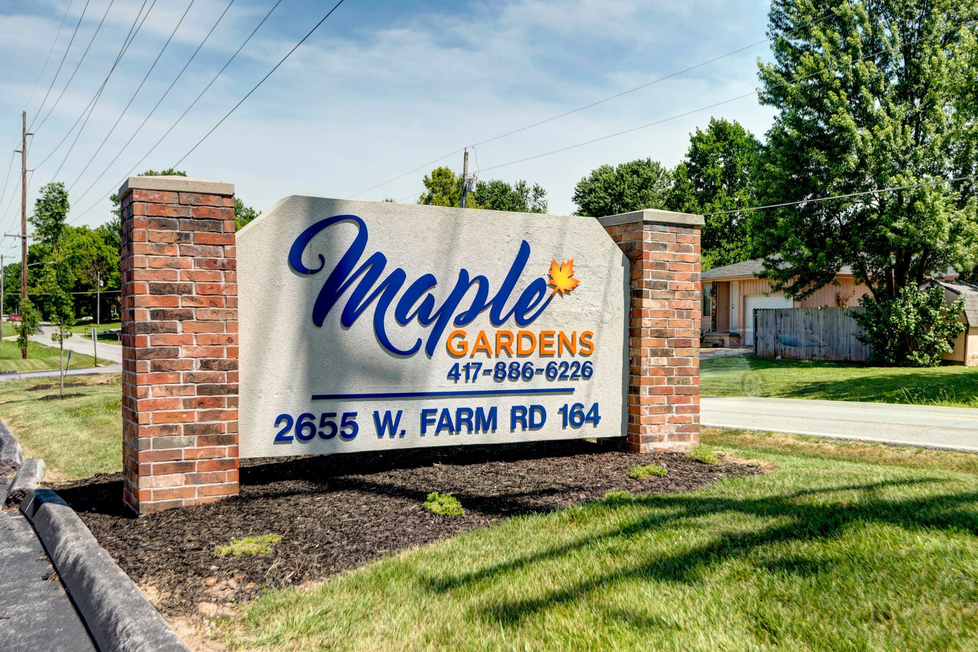 Photo of the entrance sign to the community