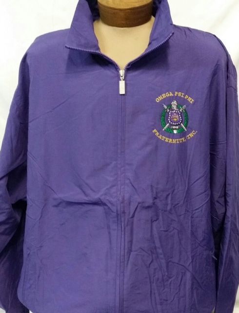 A purple jacket with the word omega on it