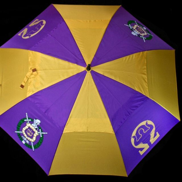 A yellow and purple umbrella with the number 25 on it