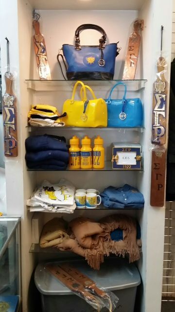 A closet filled with a variety of items including handbags and water bottles